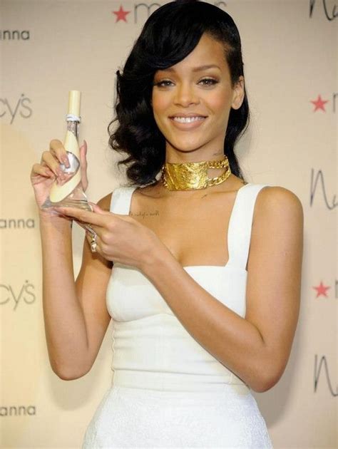 rihanna shines in white at nude by rihanna fragrance launch