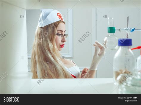 Blonde Nurse Getting Image And Photo Free Trial Bigstock