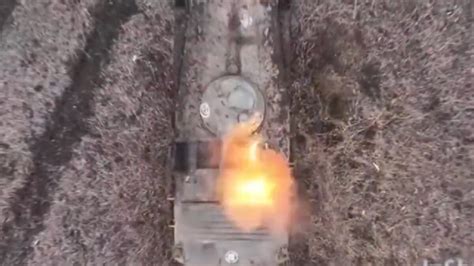footage shows ukraine dropping grenades  hatch  russian tank fortyfive