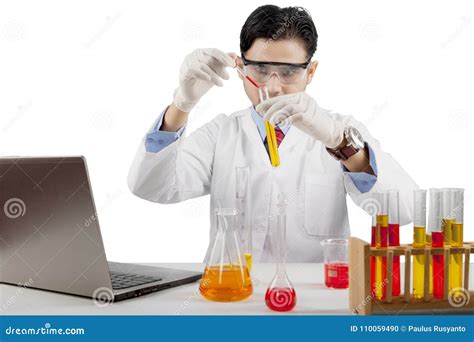 male scientist mixing chemicals isolated  white background stock photo image