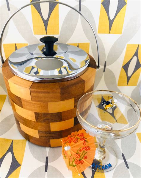 A Retro Wooden Ice Bucket With Removable Plastic Lining