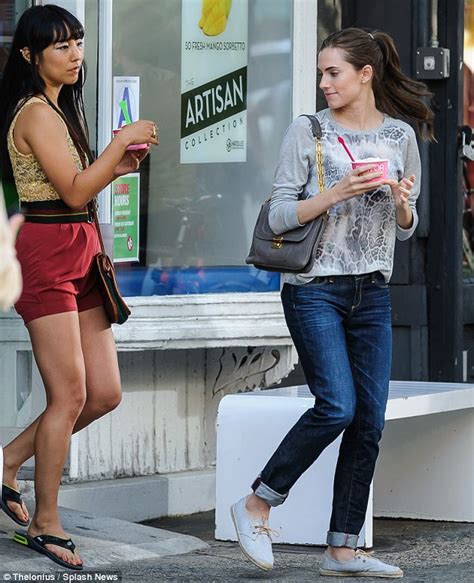 jemima kirke flashes bra and puffs on cigarette as allison williams digs into ice cream on set