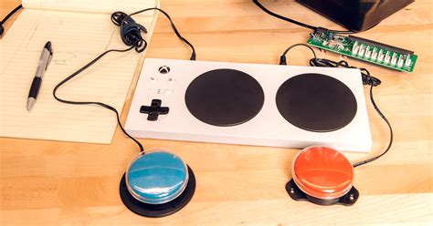 microsofts xbox adaptive controller  disabled gamers  power  wired