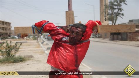 iraq the islamic state isis executes and crucifies two