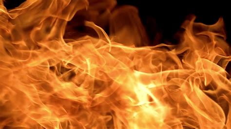 flames  fire  black background  slow motion stock video footage