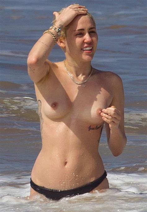miley cyrus naked showing her boobs pics and galleries
