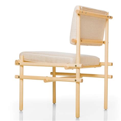 natural brazilian wood pipa chair in naked style from tiago curioni for