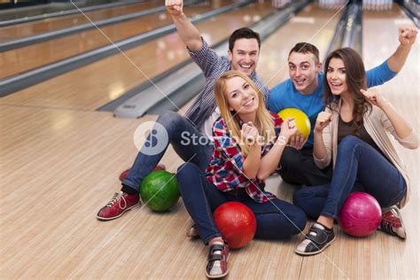 Group Of Friends At The Bowling Alley Royalty Free Stock Image