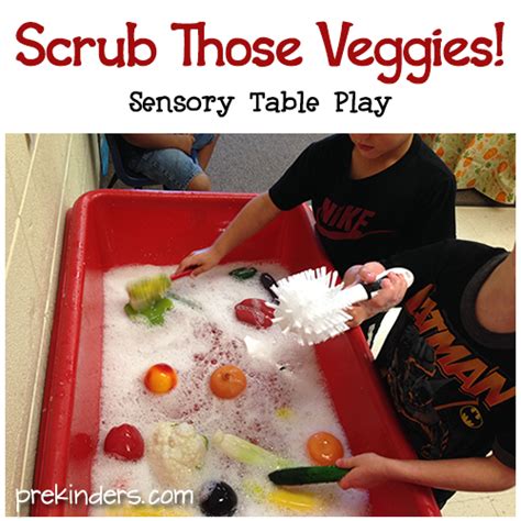 scrubbing veggies in the sensory table except do without soap and