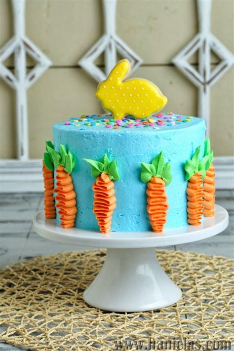 easter cake decorated  buttercream carrots  pretty bunny cookie topper cute easter food