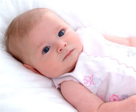 infant girl stock photo image  pink white clothing