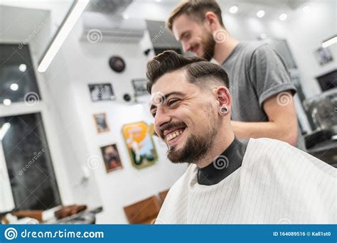 Customer Smiling In Barber Shop With Barber Fun Barber