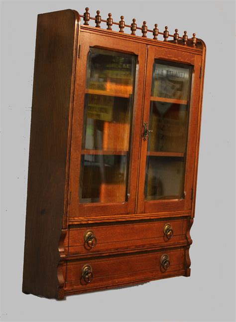 bargain john  antiques antique oak wall curio cabinet  beveled