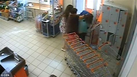 cctv captures moment 3 women kick and wrestle male shoplifter in russia