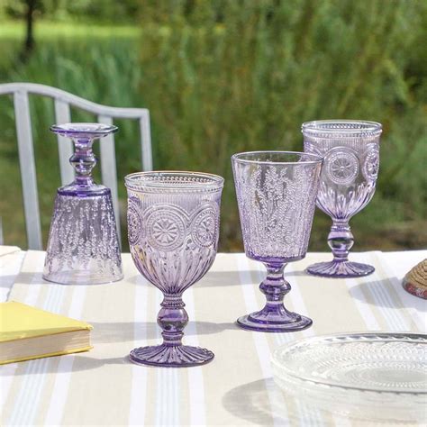 set of four purple embossed wine goblets by dibor
