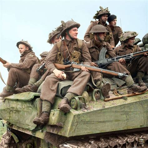 british infantry ride  sherman tanks  holland  september