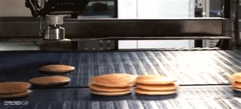 watching this robot stack 450 hot cakes a minute will hypnotize you electronic products
