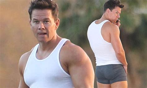 mark wahlberg shows off his impressive physique in a tight