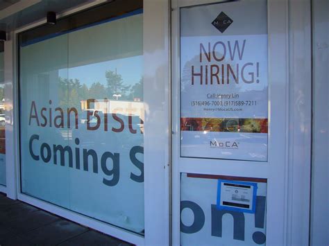 Help Wanted Sign In Store Front Fusion Restaurant