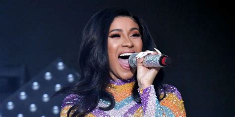 cardi b just ripped out the butt of her jumpsuit on stage at bonnaroo