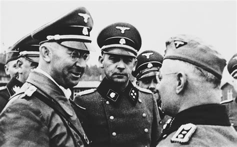 Heinrich Himmler Confers With Ss Officers While Visiting