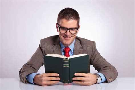 young business man holds book   hands stock photo image