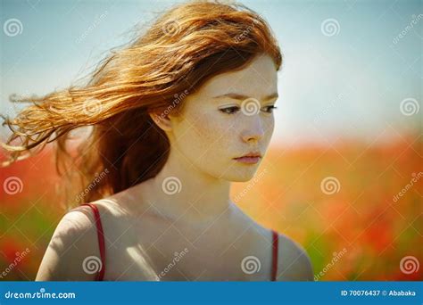 red haired beautiful girl in poppy field stock image image of