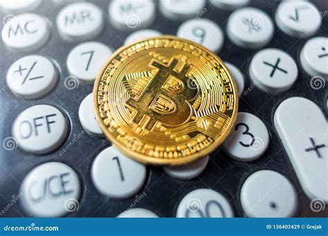 bitcoin coin   calculator stock image image  economy accounting