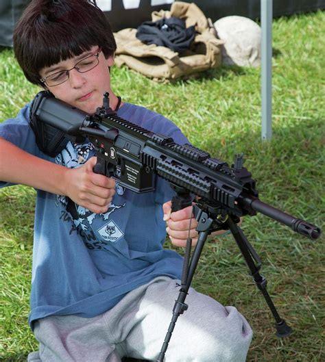 boy  automatic rifle photograph  jim west fine art america