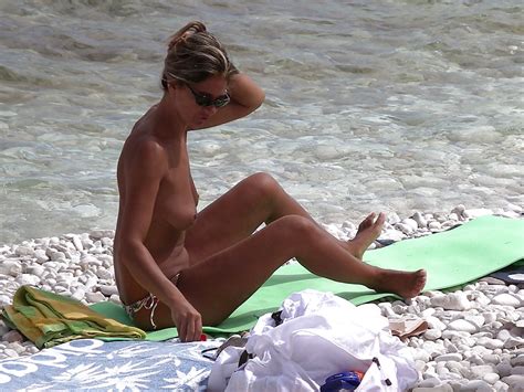 mature sunbathing topless 10 pics
