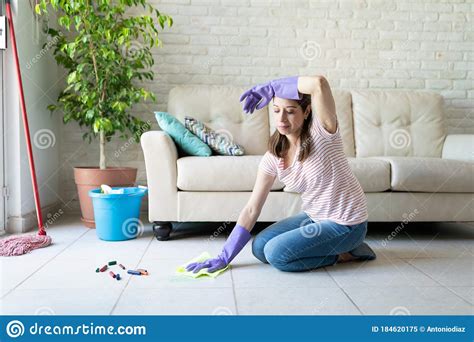 woman looking tired of cleaning her house stock image image of clean