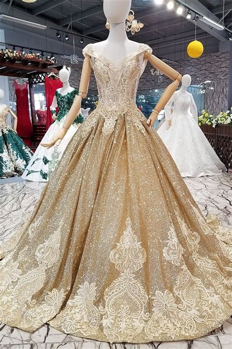 gorgeous ball gown sweetheart corset cap sleeve keyhole   sequined gold wedding dress