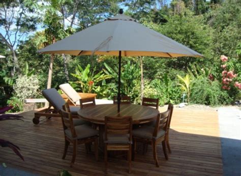 teak outdoor peninsula  dining table  chairs