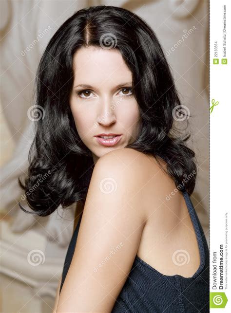 portrait of a beautiful woman with dark hair stock images