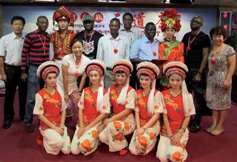 african journalists posing with members of the dali bai ethnic group at dali prefecture yunnan