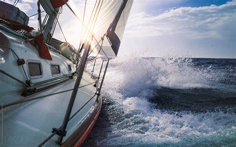 sailing yacht sails   sea sailboat speeding  stormy rough