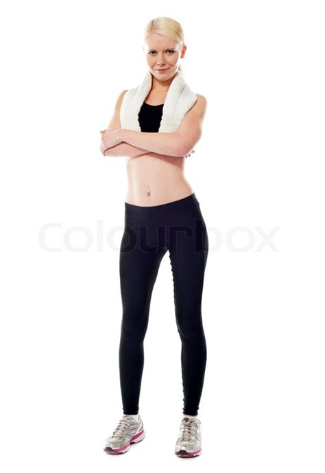 smiling sports woman standing with stock image