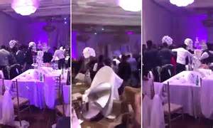 wedding brawl erupts after bride s ex puts incriminating photos on tables at the reception