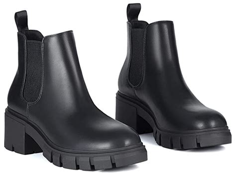 step   wearing  trendy chelsea boots    obtain  obtain