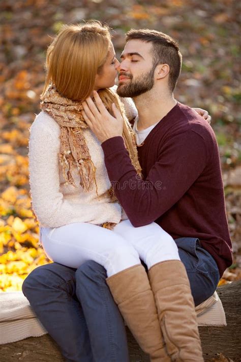 Sensual Outdoor Portrait Of Young Stylish Fashion Couple Kissing Stock