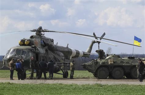 ukraine forces kill up to five rebels russia starts drill near border