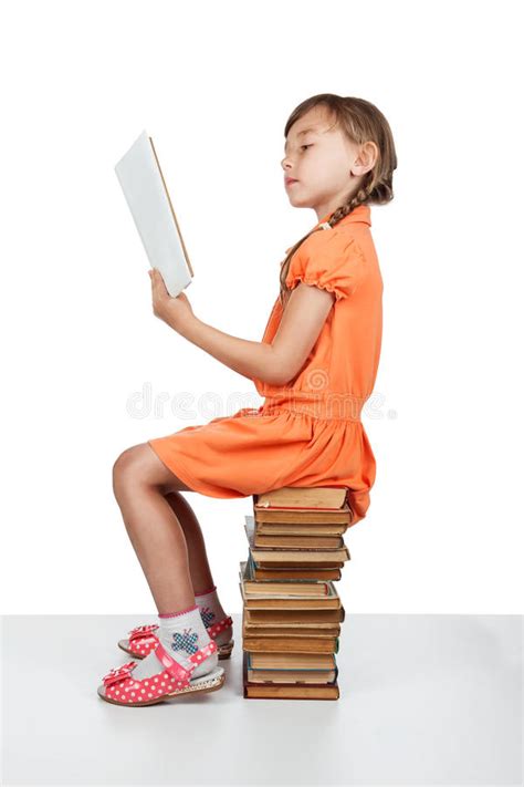 baby girl sitting  books reading  book stock image image  girl