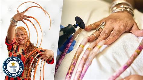 ayanna williams breaks guinness world record with longest nails