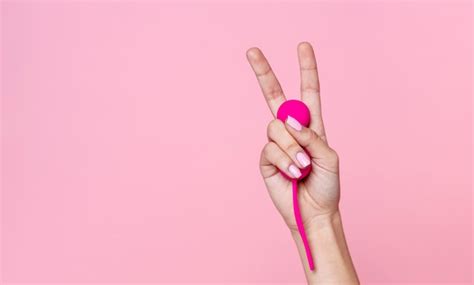 Free Photo Close Up Hand Holding Pink Sex Toy