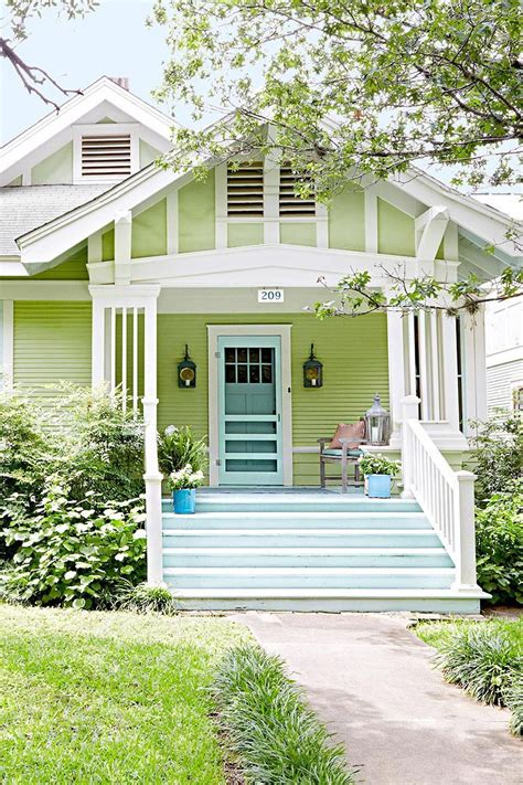 essential curb appeal ideas  front porches house paint exterior green house exterior