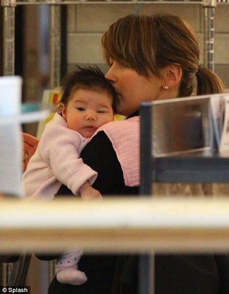 rachel stevens keeps her phone close for updates on daughter amelie during shopping trip daily