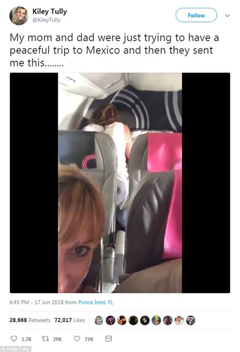 husband and wife share video of couple in row behind them