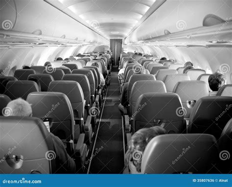passenger aircraft interior stock photo image  aisle airplane