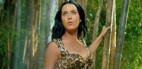 katy perry does her best ‘george of the jungle with ‘roar guyspy