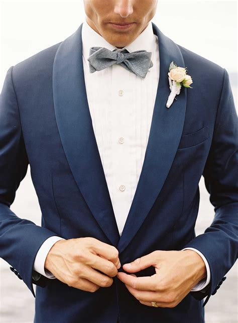 navy blue suit  blue grey bow tie